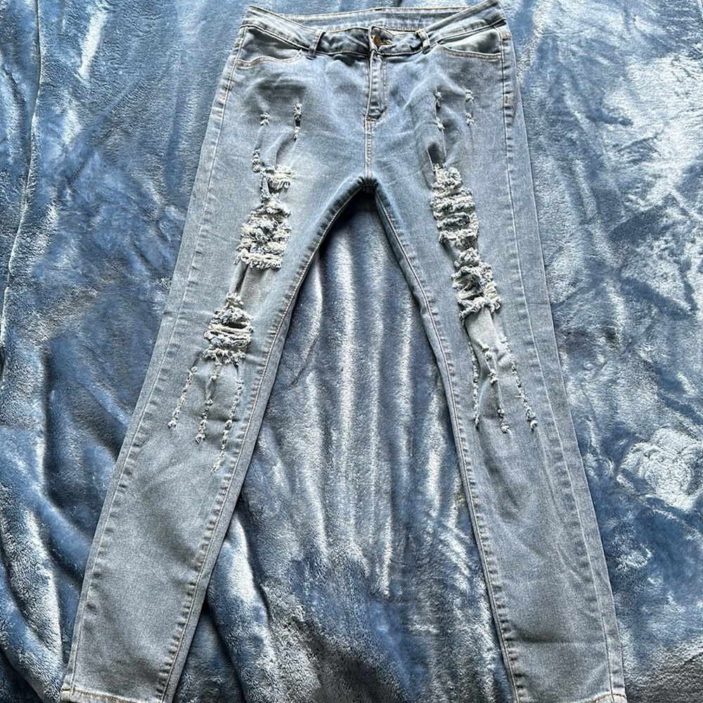 Blue distressed jeans